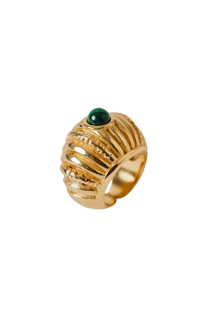 The Small Reef Ring from Paola Sighinolfi is a handcrafted, 18kt gold-plated organic ring inspired by coral gardens and featuring a green stone that exudes regal elegance and tranquility, making it a timeless and elegant accessory perfect for any formal occasion.