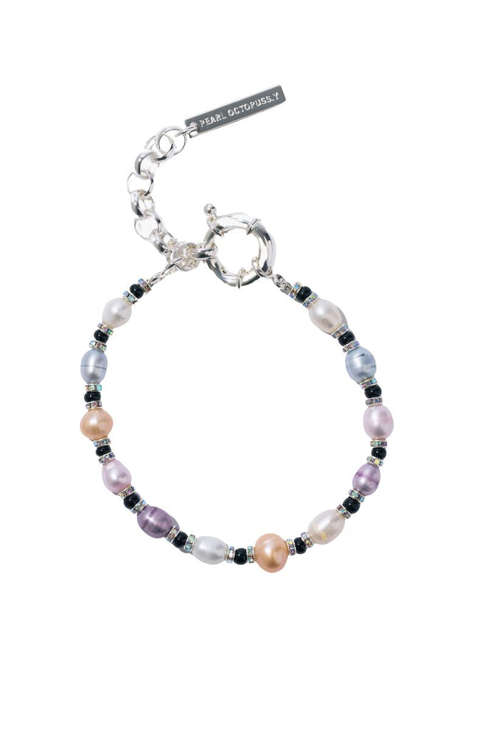 Make a playful statement with the Tous Les Jours Candy Bracelet from Pearl Octopuss.y, featuring hand-dyed mixed colored pearls with silver plated rondelle and rocaille beads!