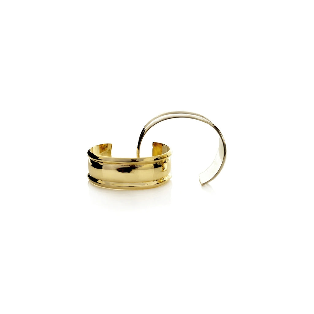 Gold hoop earring on a white background