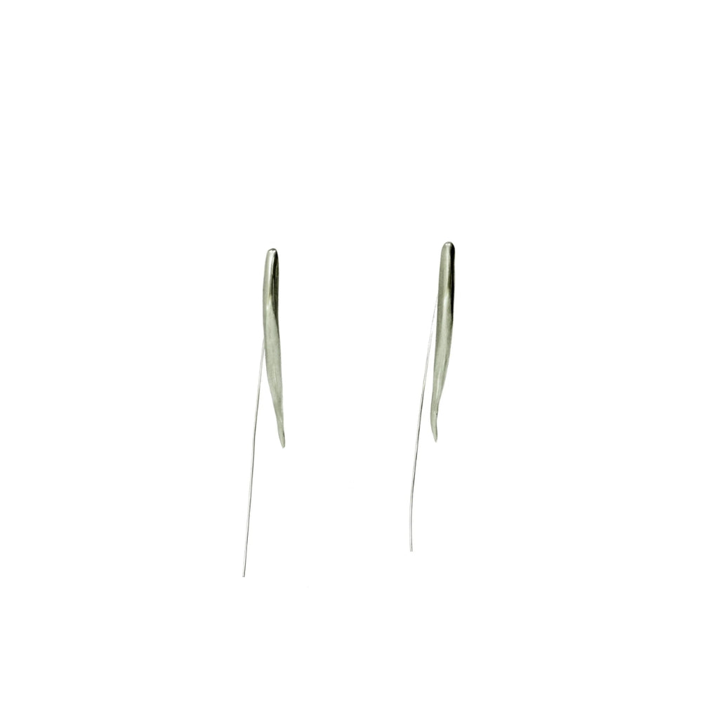 Pair of silver earrings on a white background