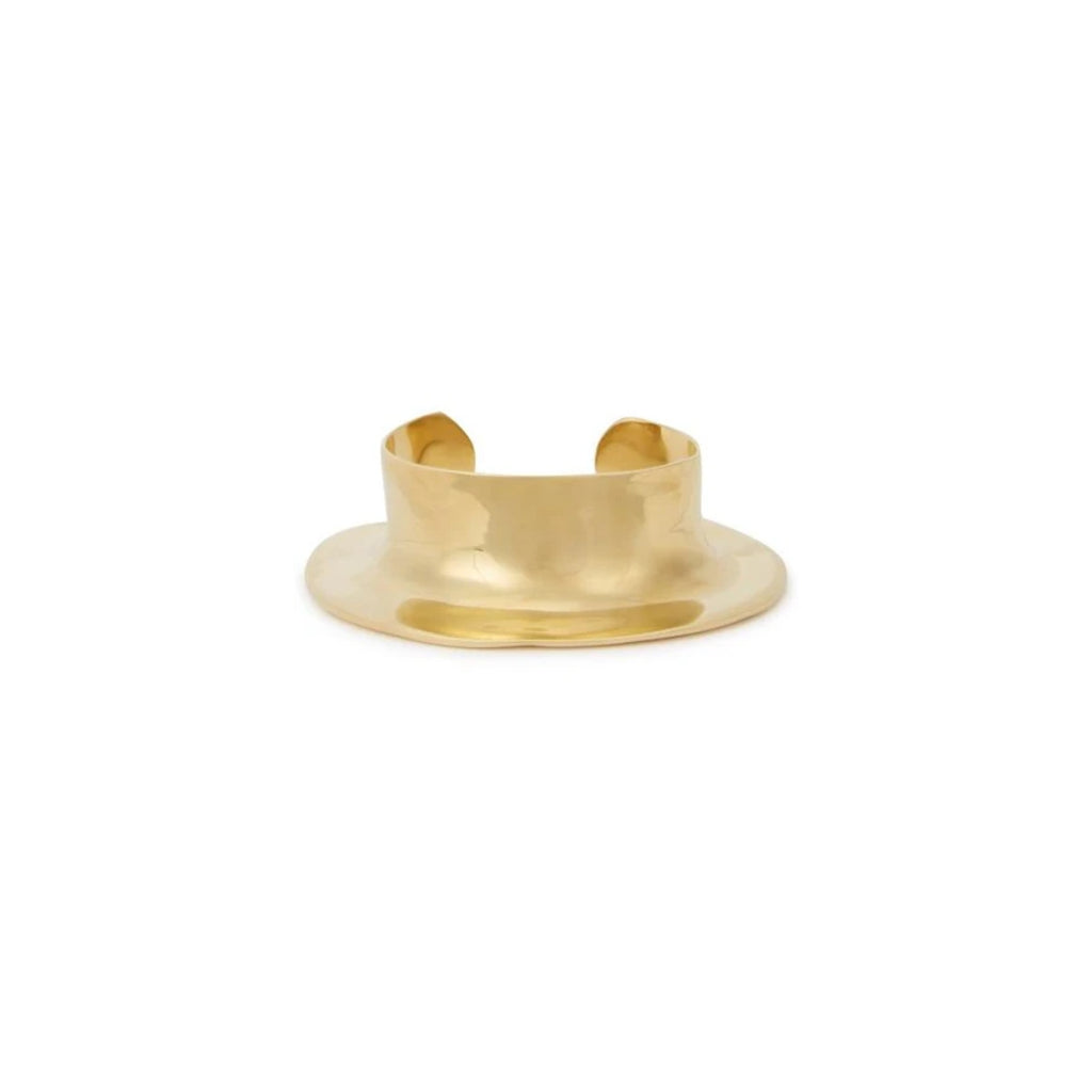 Gold cuff bracelet on a white background