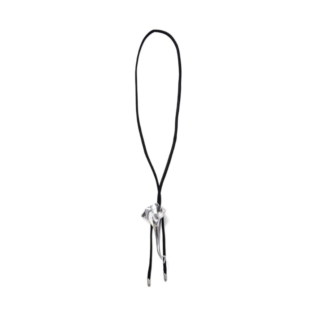 A stylish silver pendant on a black cord necklace.