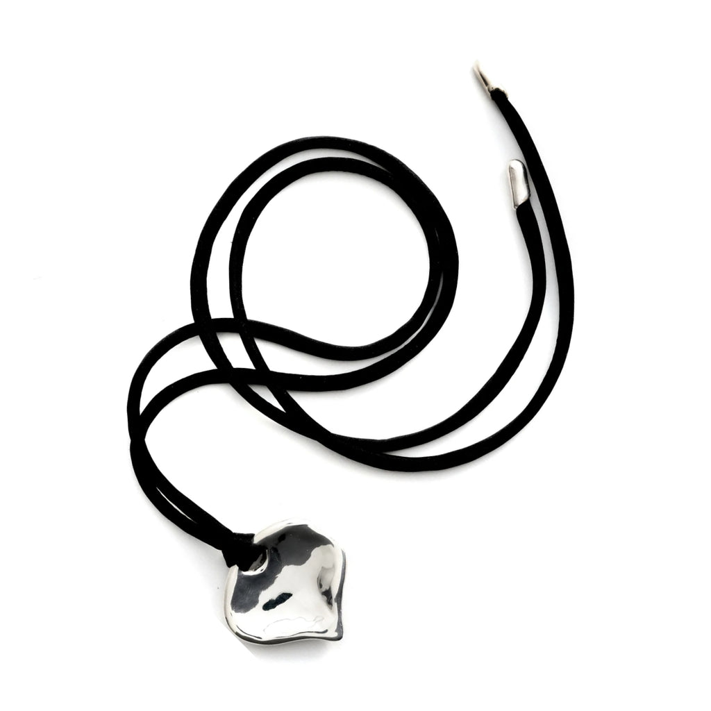 Black necklace with a silver pendant on a white background