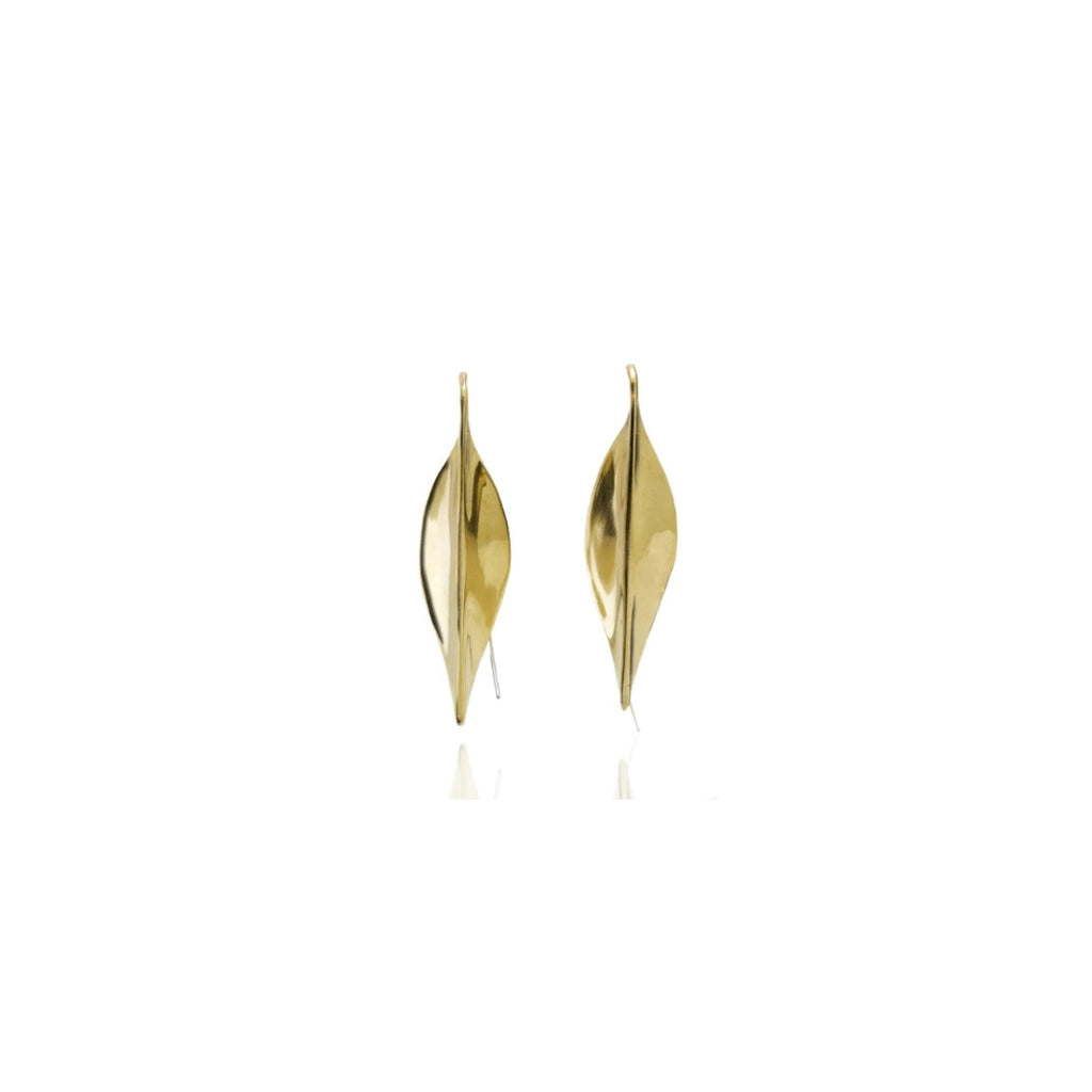 Gold earrings on a white background