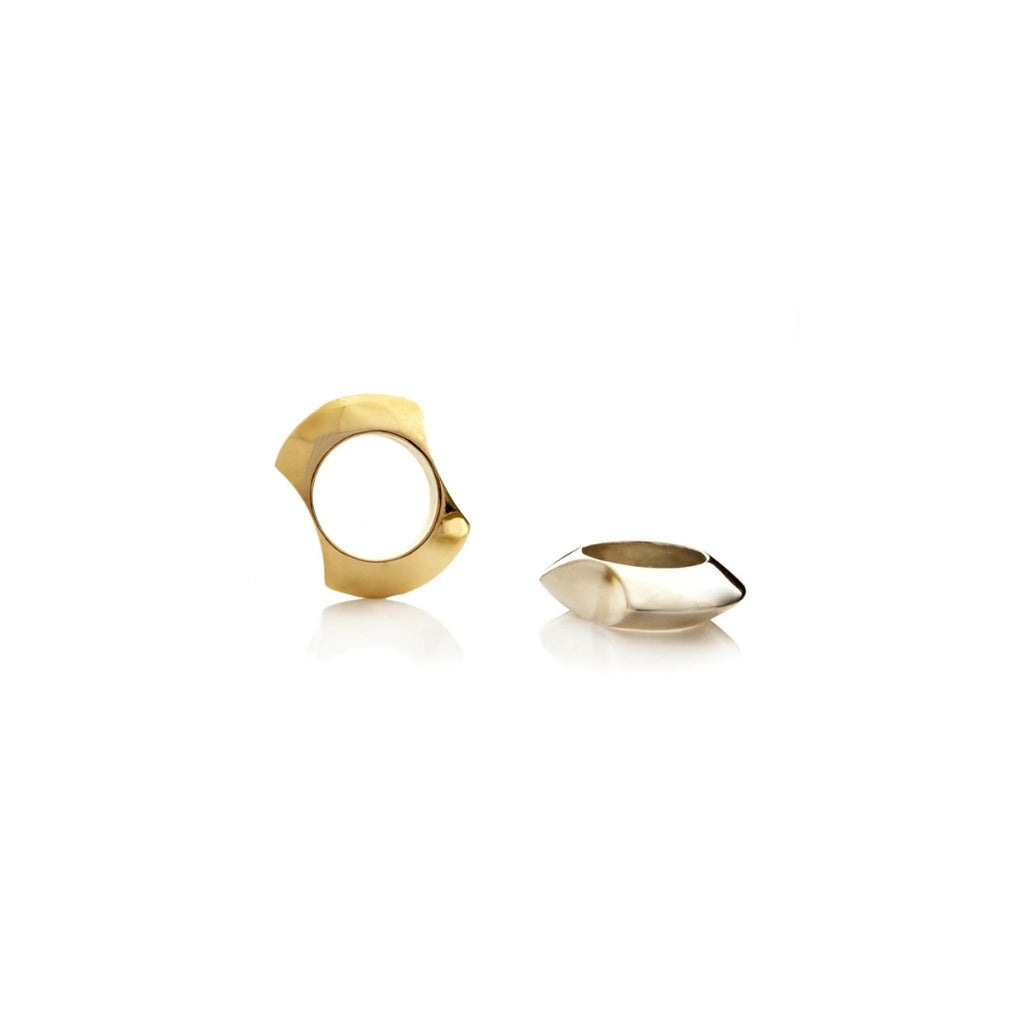 Two gold rings on a white background