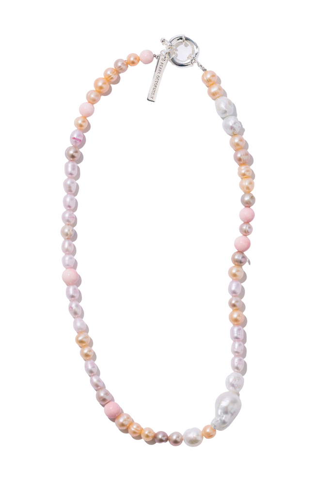 Make a statement with the unique Bon Bon Necklace from Pearl Octopuss.y , featuring a mix of hand-dyed freshwater pearls and an oversized baroque pearl detail.
