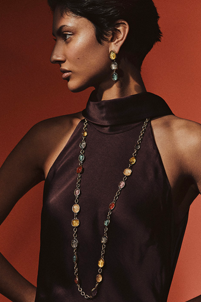 Add a touch of luxury and playfulness to your style with the Cabochons Rainbow Long Necklace from Goossens Paris, inspired by the changing colors of the seasons and carefully crafted with unique and colorful stones for a one-of-a-kind look that's perfect for any occasion.