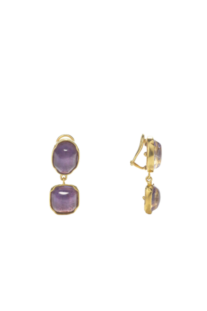 The Cabochons Two Pendants Earrings from Goossens Paris is a luxurious and bold piece of jewelry with a vibrant orchid hue and warm gold tones, adding a sense of confidence and making it a perfect addition to any jewelry collection.
