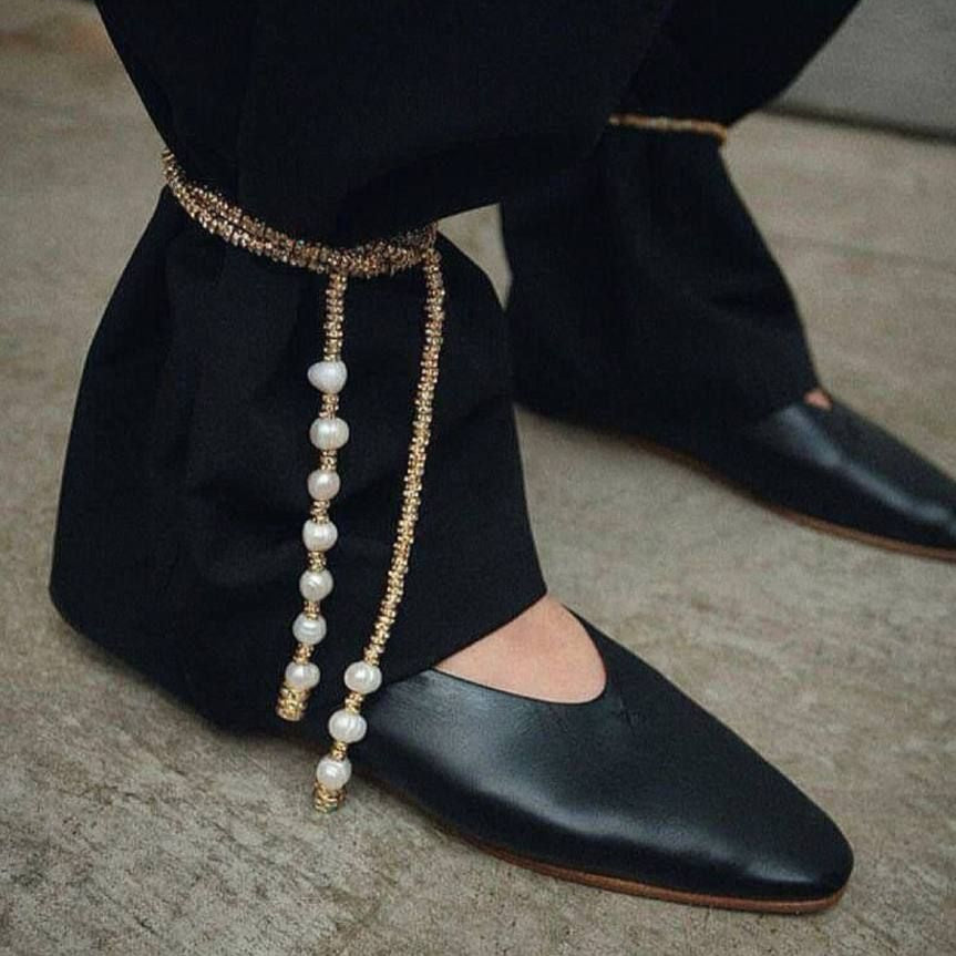 adding jewellery to their trouser legs