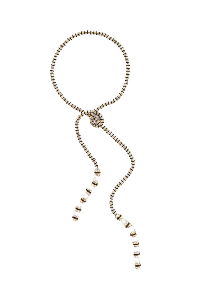 Elevate your look with the Pearl Octopuss.y Coco Zebra necklace, featuring a mix of gold- and silver-plated beads, shimmering crystals, and tipped freshwater pearls that can be tied in various ways to complement any outfit.