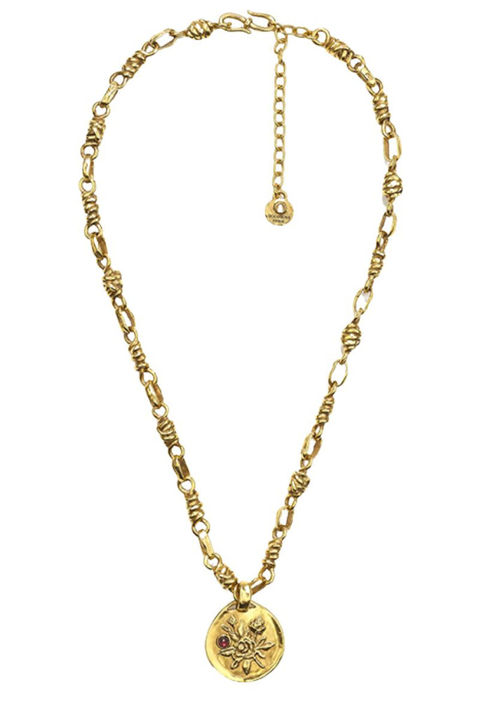 Embrace enchantment with the Collier Barrie Medaille Rosel from Goossens Paris, where delicate rose motifs in 18-carat yellow gold bloom with captivating artistry, evoking elegance, romance, and the poetic charm of nature.