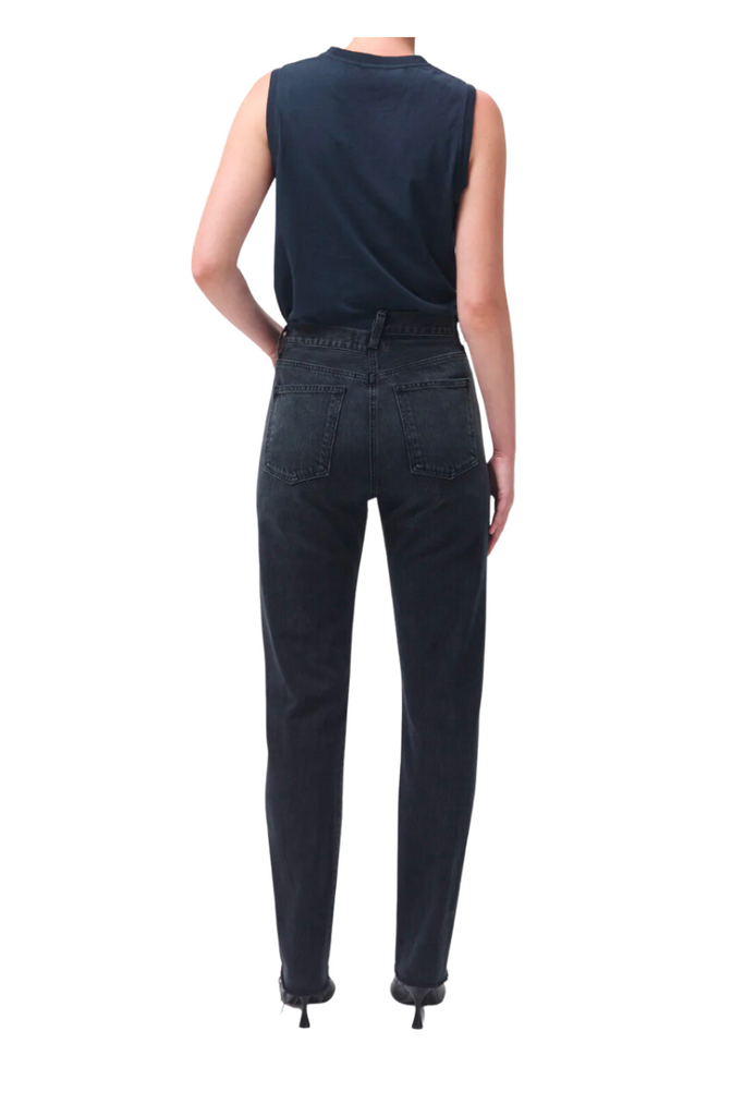 The AGOLDE Criss Cross Straight Shambles are stylish and comfortable high-rise straight leg jeans with an edgy criss cross button-front detail.