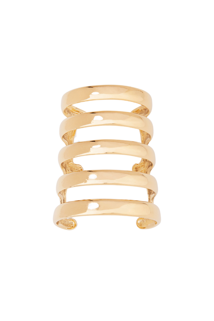 Manchette Esteban cuff by Aurélie Bidermann - wide band with glossy texture, rich gold color, perfect for formal occasions.