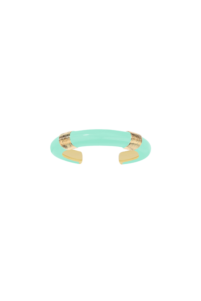 Katt bracelet by Aurelie Bidermann. Inspired by Bauhaus design, this bracelet features pure lines and a minimalist aesthetic, paying tribute to Katt Both. The playful baby blue color adds a touch of fun to the sophisticated design, perfect for dressing up or down.