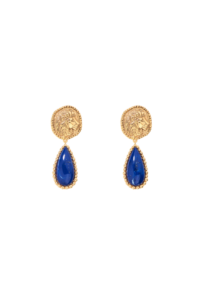 Aurélie Bidermann's Lucius earrings are a stunning tribute to the famous lions of Trafalgar Square and Buckingham Palace, featuring lapis lazuli and a central motif on a necklace.