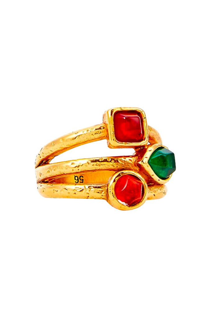 The Mini Cabochons Stacking Ring is a delicate and modern piece of jewelry with a colorful design resembling a rainbow, crafted from brass soaked in 24-carat gold bath and featuring natural rock crystal cabochons, making it a timeless and elegant addition to any collection.