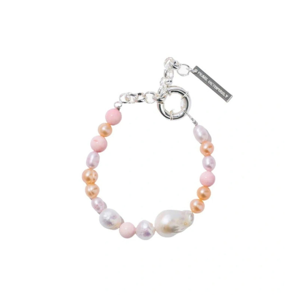 Pearl bracelet with a silver clasp on a white background