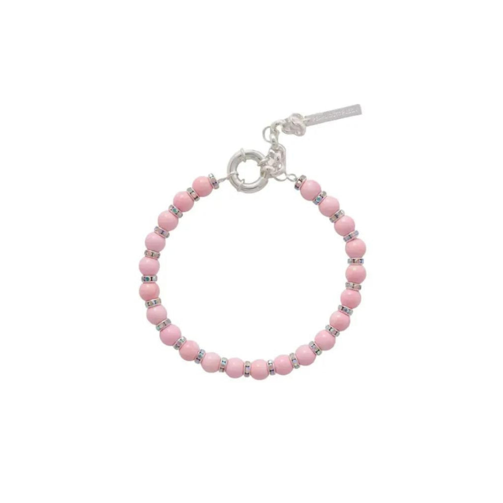 Pink beaded bracelet with silver clasp on a white background