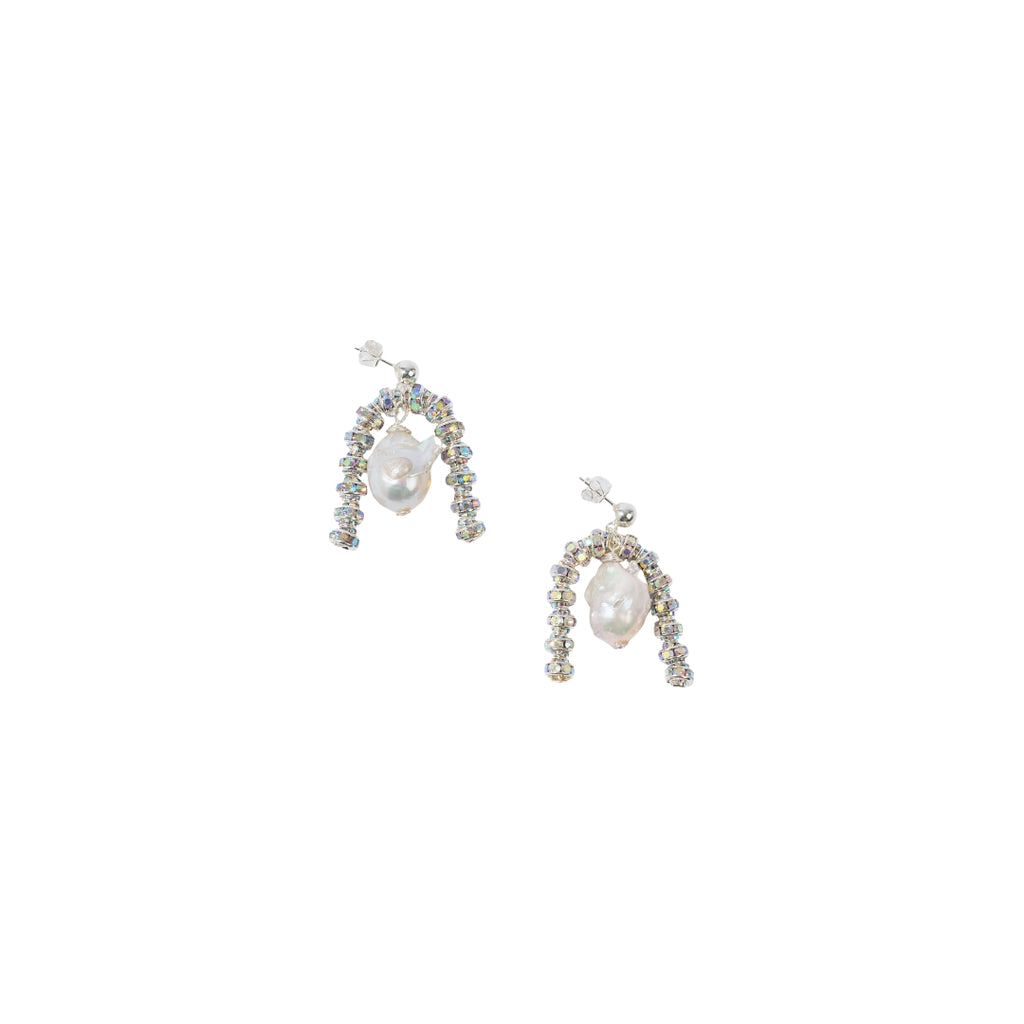 Pair of pearl and bead earrings on a white background