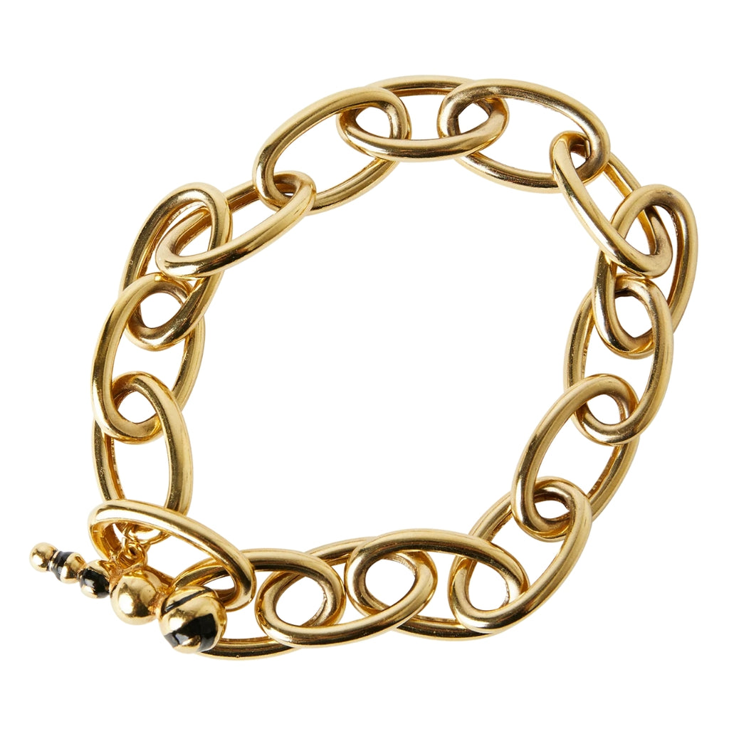 Gold chain bracelet with a  black enamel clasp