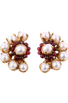 The Perles Baroques line is a stunning collection inspired by the Renaissance era, featuring natural white baroque freshwater pearls, rock crystal cabochons, and deep red garnet pearls, with the standout piece being the modern and elegant Perle Baroque Clip Asymmetric Earrings.