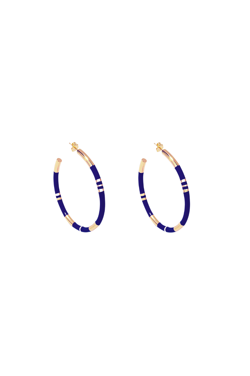 The Aurelie Bidermann Blue Positano Earrings features delicate blue resin with gold color, creating a timeless and elegant look. 