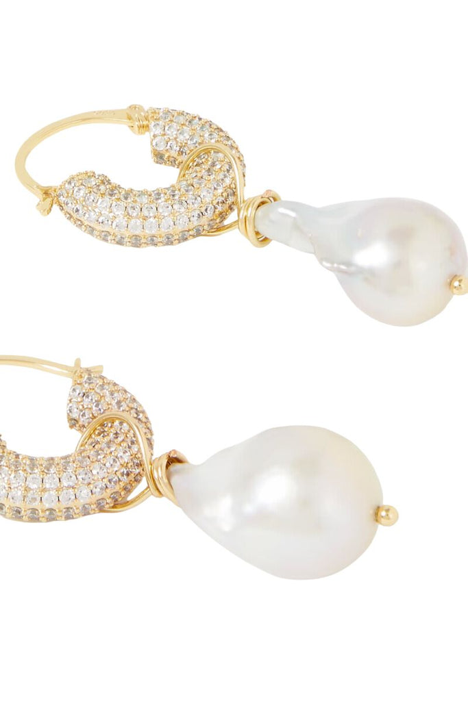 Add a touch of sophistication to your style with Pearl Octopuss.y's 'Riviera' earrings, featuring chunky gold-plated hoops wrapped in cubic zirconia and detachable freshwater pearl drops.