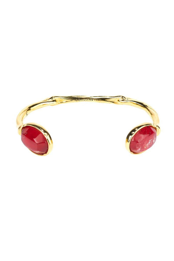 The Talisman Cabochon Bracelet from the House of Goossens is a stunning representation of the new floral theme in the Talisman collection, crafted from brass soaked in 24-carat gold and adorned with Indian ruby tinted rock crystal cabochons, combining delicacy with rigidity and exuding sophistication and elegance.