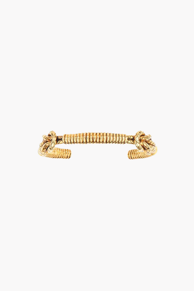  Experience the timeless spirit of the snake with the stunning Tao Bangle by Aurelie Bidermann, crafted with a 750/1000 yellow gold-plated design and innovative finish.