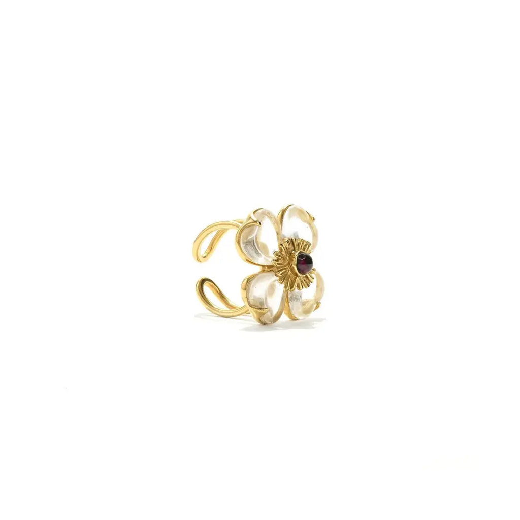 The Trefle Ring by the House of Goossens is an exquisite and versatile lucky charm, featuring three clovers crafted from rock crystal stones, freshwater pearls, and available in three types of stones, all set on a 24-carat gold bathed brass ring.