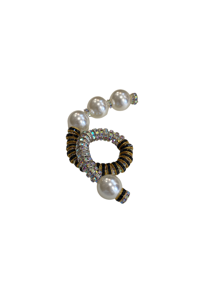 Indulge in the beauty of imperfection with Pearl Octopuss.y's Baroque Pearl Brooches, handcrafted with oversized freshwater baroque pearls and set in gold and silver plated material, sold in singles and perfect for cufflinks or collar tips.