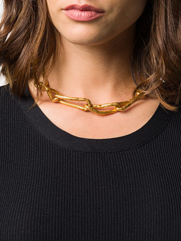 Find love and connection in the midst of our modern-day wasteland with The Wasteland Choker, a stunning piece of jewelry inspired by T.S. Eliot's "The Waste Land" and its grounding anchor shapes and intricate links.