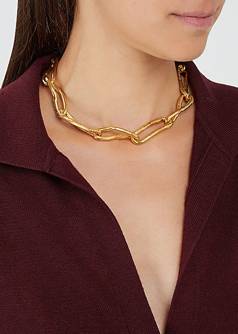 Find love and connection in the midst of our modern-day wasteland with The Wasteland Choker, a stunning piece of jewelry inspired by T.S. Eliot's "The Waste Land" and its grounding anchor shapes and intricate links.
