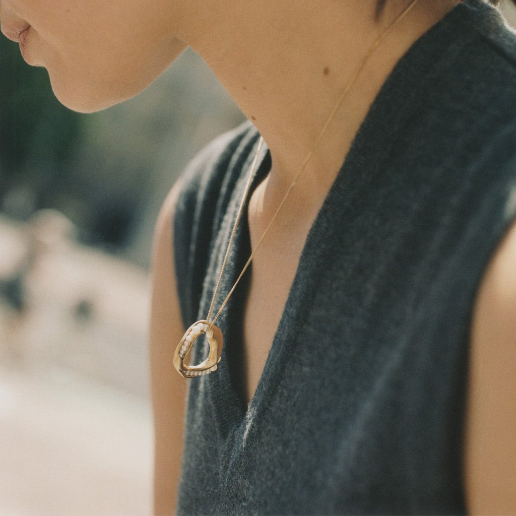 Completedworks Drippity Drip Pearl and Gold Plated Pendant